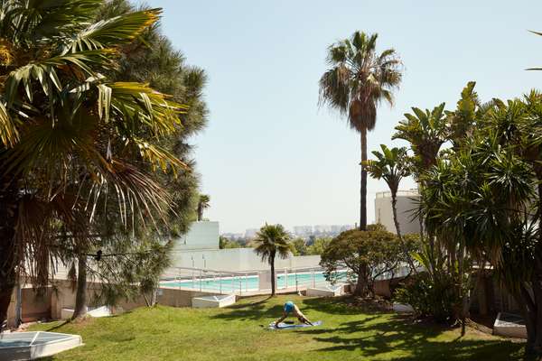 Afternoon yoga on the third-floor tropical garden