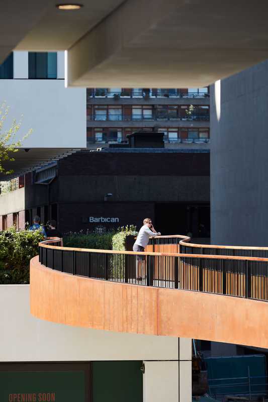 The elevated walkway connects offices with the Barbican Centre 