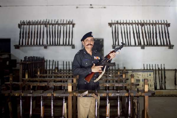 Ahmed in the armoury at the police HQ 