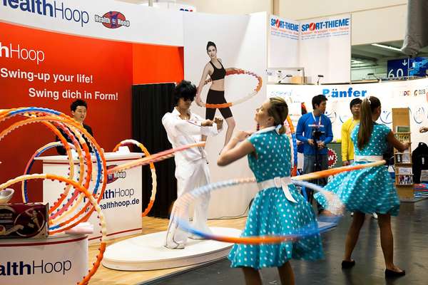 Elvis impersonator at the Health Hoop stand