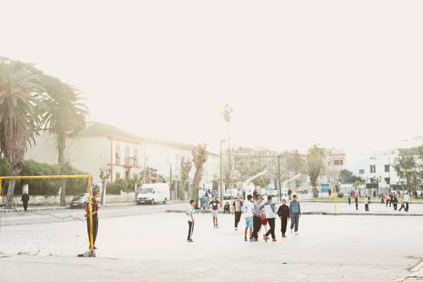 Children playing football in Marshan