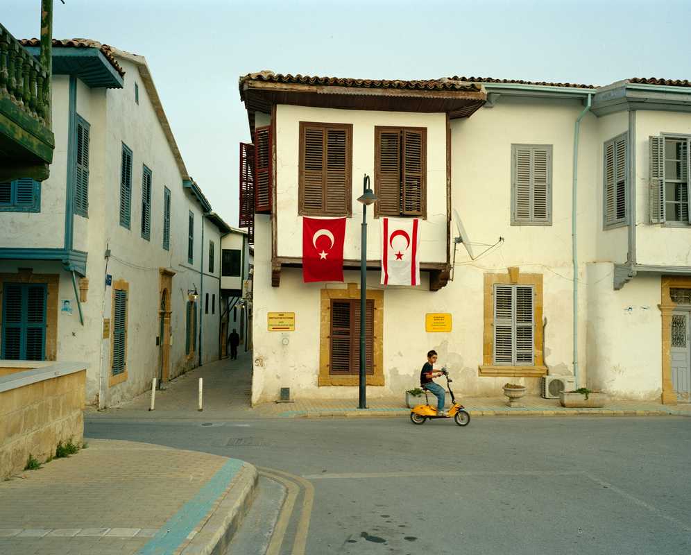 Turkish flag flies next to a TRNC one in Nicosia