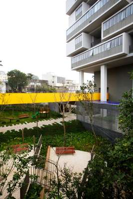 The main entrance is reached by a suspended walkway