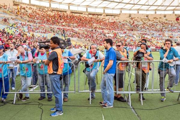 Reporters wait for players to emerge at the Maracanã