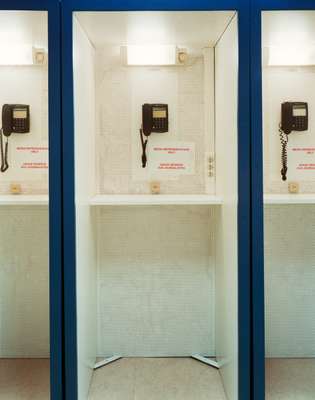 Old-school phone booths reserved for old-school journalists who still phone in their stories