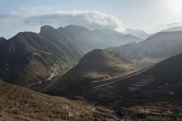 The Dhofar Mountains make for a stunning backdrop