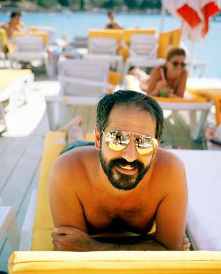 Grabbing some shade at White Beach in Cesme