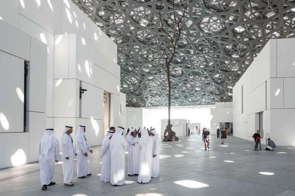 Louvre Abu Dhabi atrium with lattice-work roof by Jean Nouvel