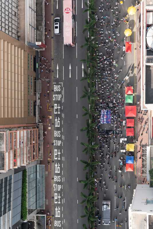 Protesters wend their way along Hennessy Road, Hong Kong