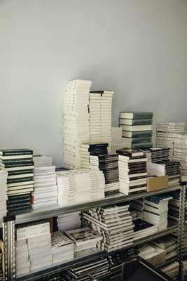 Racks piled high with publications at Spector Books’ office