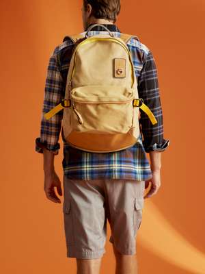 Patchwork shirt, cargo shorts and  backpack, all Eye Loewe Nature 