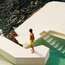 Swim shorts by Frescobol Carioca, sunglasses by Ray-Ban