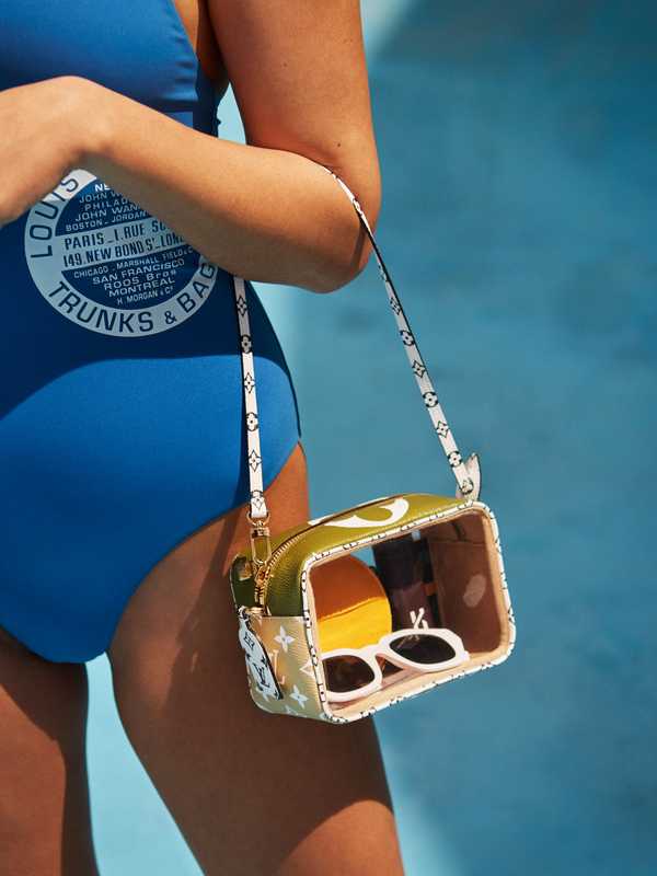 Swimwear and bag by Louis Vuitton, sunglasses by Burberry, purse by Smythson, travel perfume case by Byredo, lipstick by Chanel