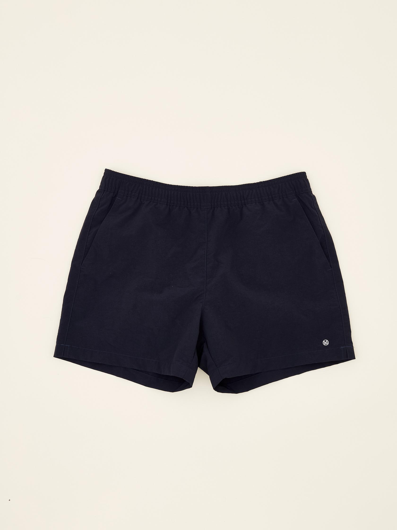 comme de garcons swim trunks