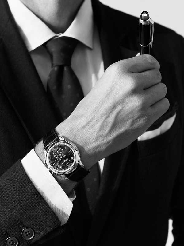 JACKET AND SHIRT BY Brooksfield, TIE by Drake’s, POCKET SQUARE by Timothy Everest, 5905P WATCH by Patek  Philippe, STARWALKER BLACK RESIN PEN by Montblanc 