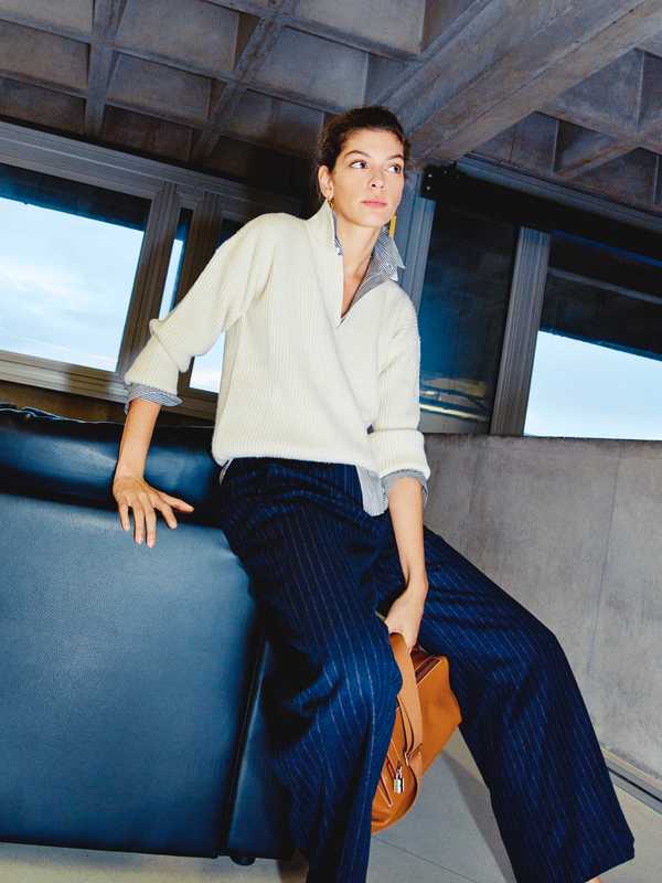 Jumper by CristaSeya, shirt and earrings by Celine, trousers by Patou, bag by Hermès