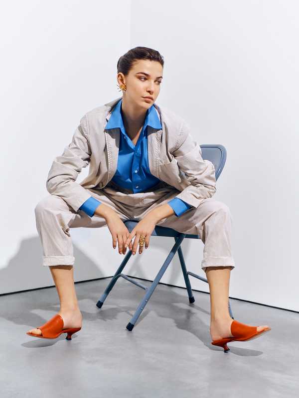 Jacket and  trousers by The Gigi, shirt, earring and ring by Dior, sandals by Tod’s 