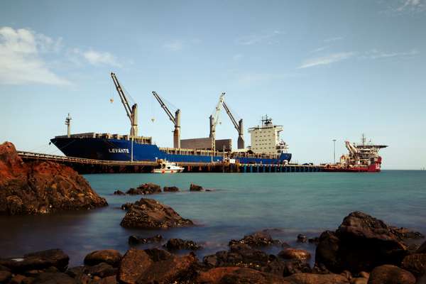 Boat transporting mining equipment is docked at Dampier Port WA