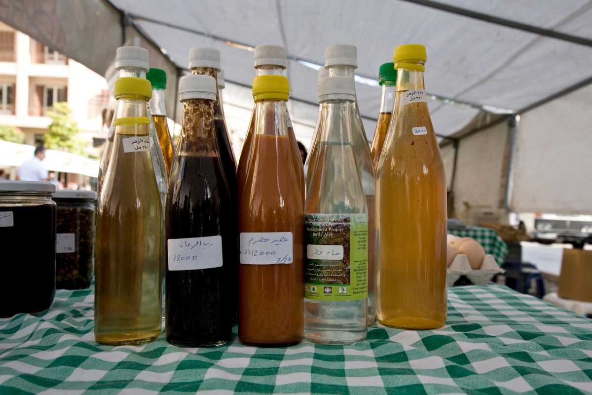 Massoud’s homemade flower extract, pomegranate and grape syrups at Souk el Tayeb market
