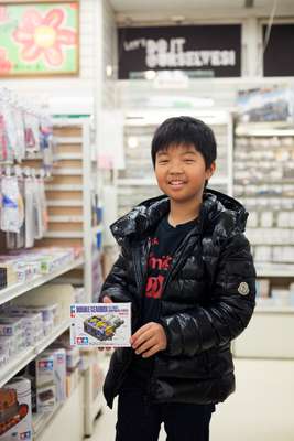 Shunta Yamamoto, 10, with a new piece for his train set 