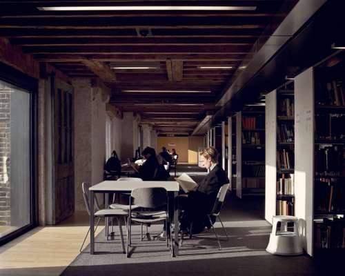 Students on the second floor library in the Granary Building