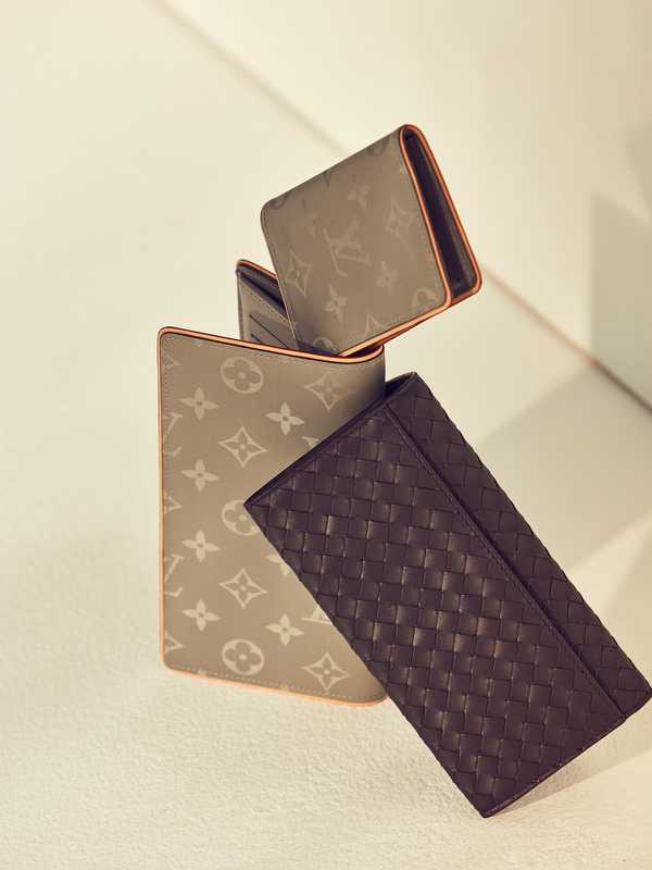 Wallet and card case by Louis Vuitton, wallet by Bottega Veneta
