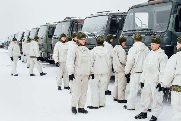 Inspecting vehicles in the snow 