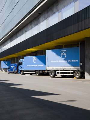 V-Zug lorries lined up outside the logistics building
