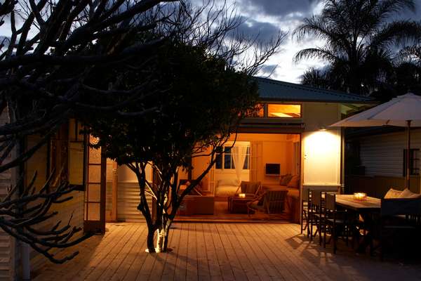 Living room opens onto the outdoor dining area