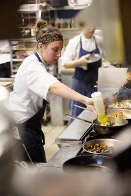 Cooks working their magic in the kitchen