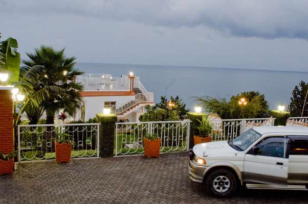 Upmarket residence on Lake Kivu – with its obligatory SUV