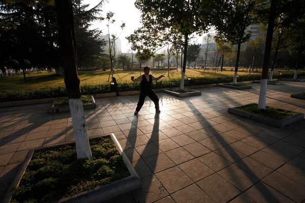 Early morning exercising in Dong Feng Square