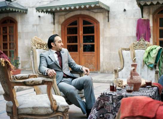 Mazen Salah, designer and owner of a textile store next to the souk