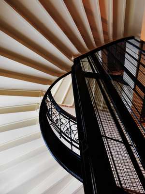 Wrought iron stairwell and lift shaft of Block C