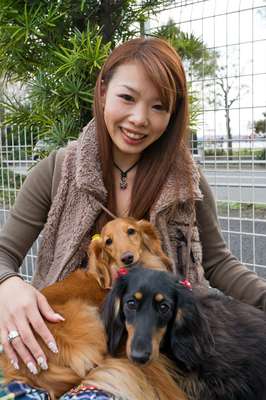 Megumi Karasawa with Bell (gold) and Niko (black tan)