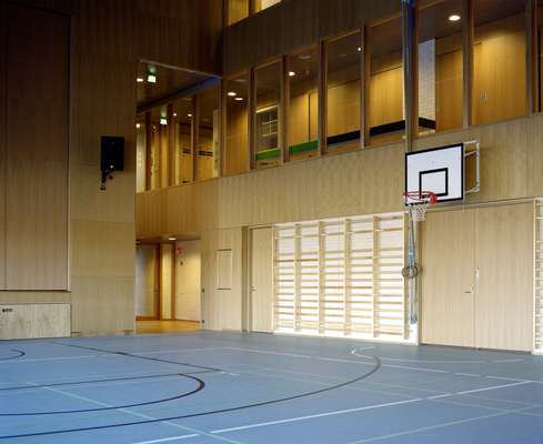 The beech-clad gymnasium, which doubles as a performance space