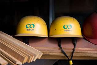 Company logo on the hard hats