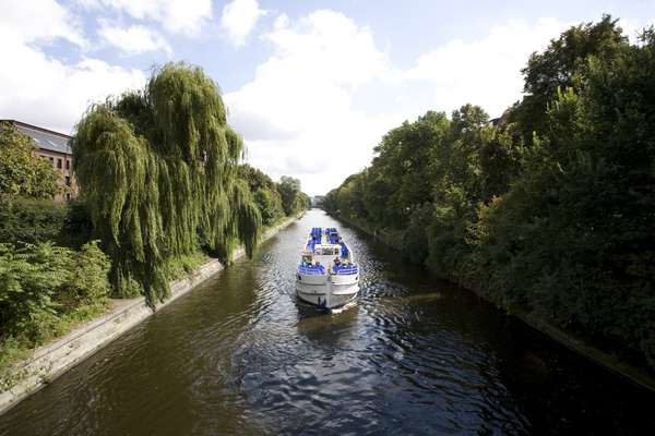 Boat glides along the Landwehr canal