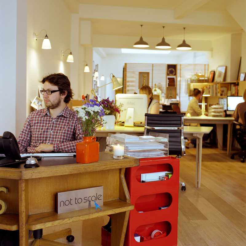 Office 4 (not to Scale, London): Scented candles, vintage furniture and lighting set the scene
