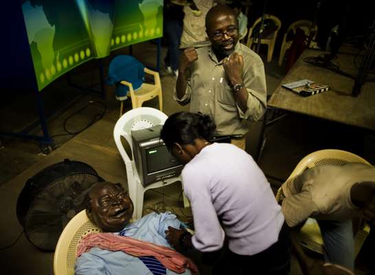 Filming a Kibaki puppet 
