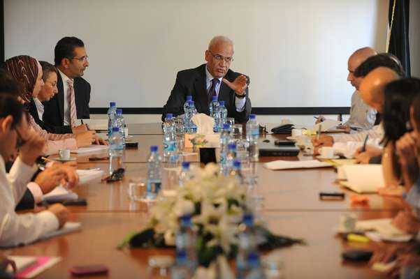 Meeting with his staff at the Negotiations Affairs Department