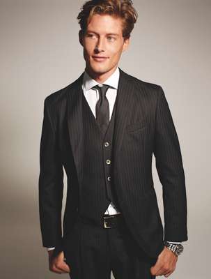 Three-piece suit by Boglioli, shirt by Rake, tie by Richard James, belt by Canali, watch by Seiko