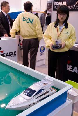 A radio-controlled boat shows how a thruster helps with boat parking