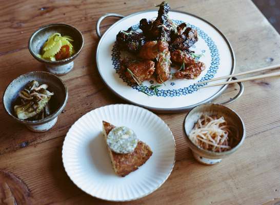 Korean fried chicken with corn bread and pickles