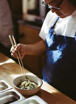 Cho applying the final touches to soba noodles