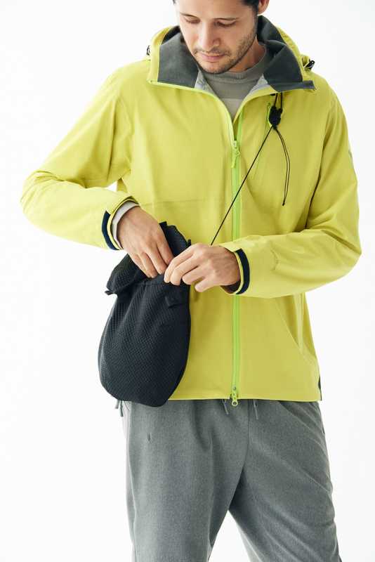 Jacket by Helly Hansen, t-shirt by TS(S), trousers and bag by  Alk Phenix