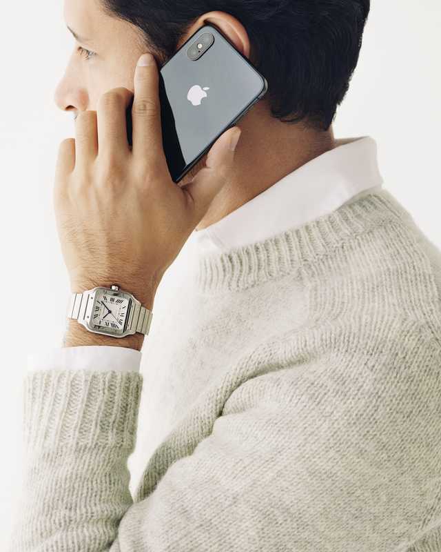 Jumper by Brooksfield, shirt by Golden Goose Deluxe Brand, watch by Cartier,  phone by Apple