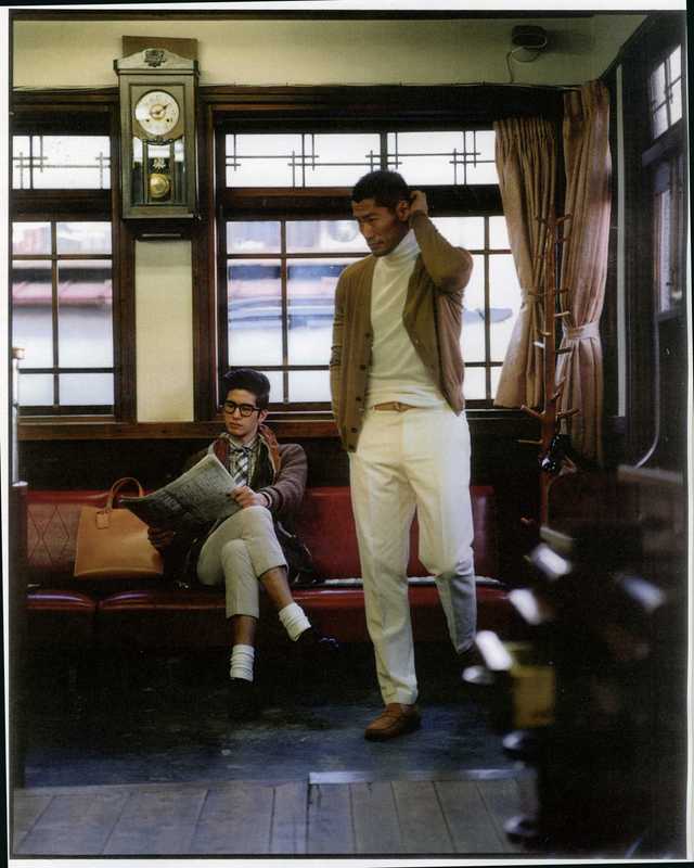 Alex (LEFT) wears glasses by Moscot, jacket by Mcritchie for Tomorrowland, shirt by Errico Formicola for Tomorrowland, scarf by Roda for Tomorrowland, tie by Seaward & Stearn for Tomorrowland, trousers by Visvim, shoes by Nepenthes, bag by Porter. Yusuke (RIGHT) wears cardigan by Prada, jumper by Hermès, trousers by Dior Homme, belt by Andrea Greco for Tomorrowland, shoes by Tod’s
