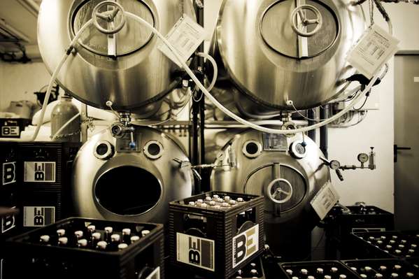 Beer ferments in huge vats for six weeks