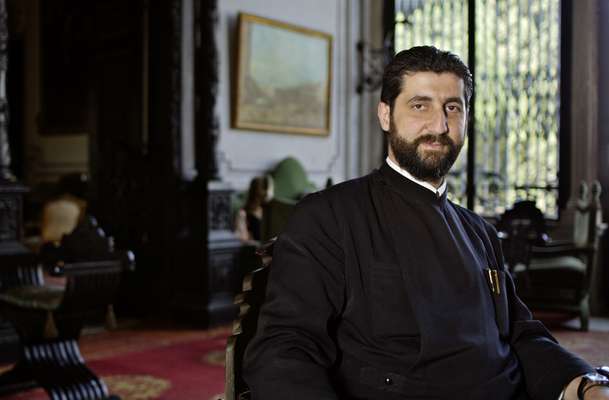 Greek Orthodox priest in the Palais Sursock